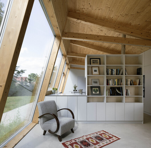 Modular House with a Sloping Facade / Papundekl Architects Modular House with a Sloping Facade / Papundekl Architects - Interior Photography, Wood, Shelving, Lighting, Chair, Table, Glass