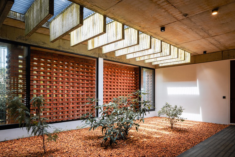Light Through the Wall: Indian House Interiors Shaped by Brick Jali - Featured Image