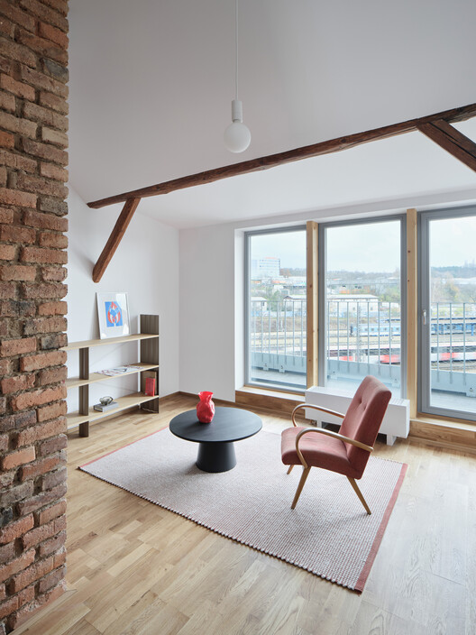 Harfa Rooftop Extension / matěj šebek architekti Harfa Rooftop Extension / matěj šebek architekti - Interior Photography, Living Room, Wood, Chair, Lighting