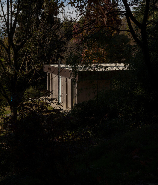 An unfinished domestic device as a threshold between interior and landscape / EX. An unfinished domestic device as a threshold between interior and landscape / EX. - Exterior Photography, Wood