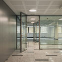Mixed-Use Office, Warehouse and Parking Building / KF arquitectes - Interior Photography,           Parking, Lighting