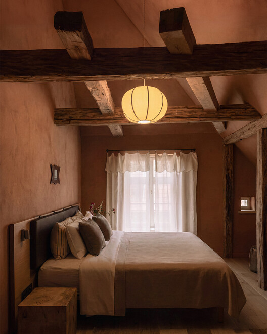 Ausma Hotel / Field Studio Ausma Hotel / Field Studio - Interior Photography, Bedroom, Wood, Lighting, Bed