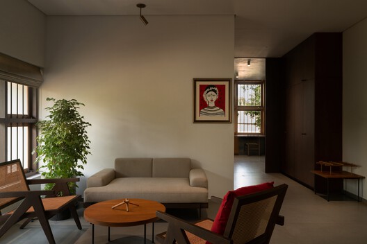 House Beyond the Mango Trees / inLe architects House Beyond the Mango Trees / inLe architects - Interior Photography, Living Room, Wood, Table, Lighting, Chair