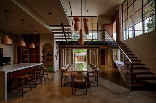 Bare Brick House / Yuuga Design Collective Bare Brick House / Yuuga Design Collective - Interior Photography, Dining room, Wood, Table, Lighting, Chair, Beam
