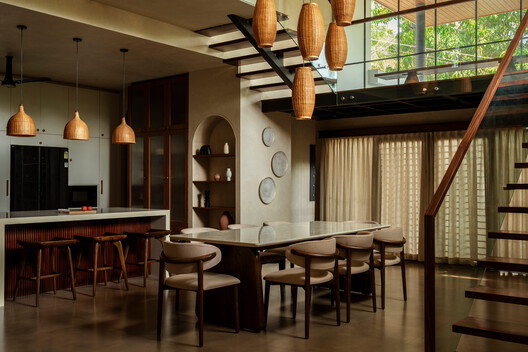 Bare Brick House / Yuuga Design Collective Bare Brick House / Yuuga Design Collective - Interior Photography, Dining room, Table, Wood, Chair, Lighting