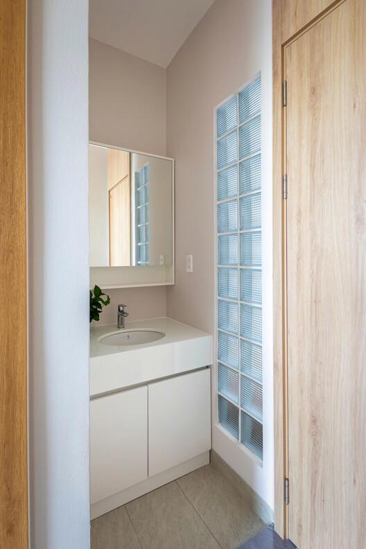 Calm Haven House / ADA Design & Build Calm Haven House / ADA Design & Build - Interior Photography, Bathroom, Wood, Lighting, Door, Glass, Countertop, Sink