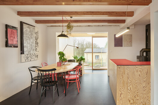 House With a Red Addition / Facha architekti House With a Red Addition / Facha architekti - Interior Photography, Dining room, Wood, Table, Lighting, Chair