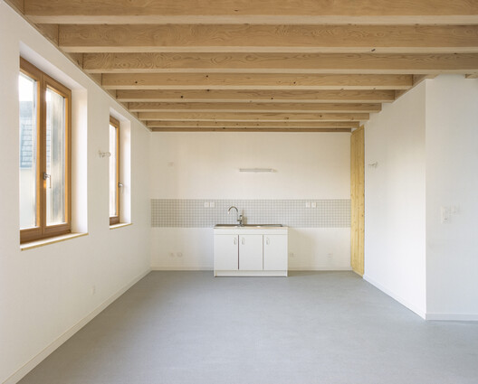 Two Multi-Family Housing Units / Aplomb Two Multi-Family Housing Units / Aplomb - Interior Photography, Kitchen, Wood, Beam