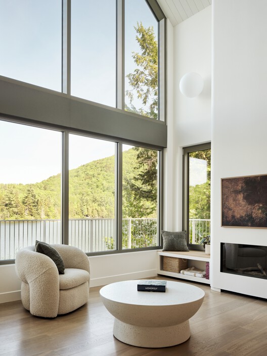 Wild Pond Villa / L. McComber  - Interior Photography, Living Room, Wood, Lighting, Table, Chair