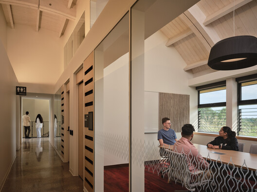 Indigenous House / Formline Architecture + Urbanism + LGA Architectural Partners Indigenous House / Formline Architecture + Urbanism + LGA Architectural Partners - Interior Photography, Wood, Lighting, Chair