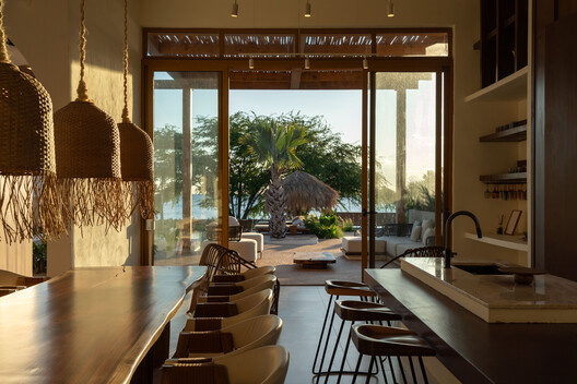 Piedra Bay House / U-Guide Space Design Atelier Piedra Bay House / U-Guide Space Design Atelier - Interior Photography, Dining room, Wood, Table, Chair