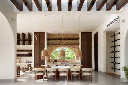 Piedra Bay House / U-Guide Space Design Atelier Piedra Bay House / U-Guide Space Design Atelier - Interior Photography, Dining room, Wood, Lighting, Table, Chair