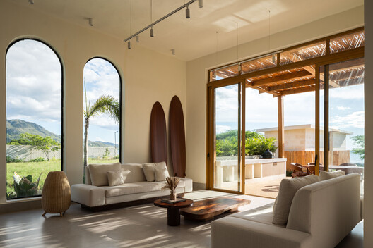Piedra Bay House / U-Guide Space Design Atelier Piedra Bay House / U-Guide Space Design Atelier - Interior Photography, Living Room, Wood, Table, Lighting, Sofa, Chair