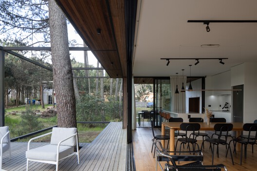 Anja House / iHouse estudio Anja House / iHouse estudio - Interior Photography, Dining room, Wood, Door, Deck, Chair