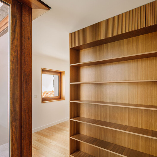 Poliedro I House / Volume Architecture Lisbon Studio Poliedro I House / Volume Architecture Lisbon Studio - Interior Photography, Closet, Wood, Shelving