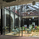 Claranet Portugal Headquarters / PROMONTORIO - Interior Photography, Office Buildings, Arch, Arcade, Chair
