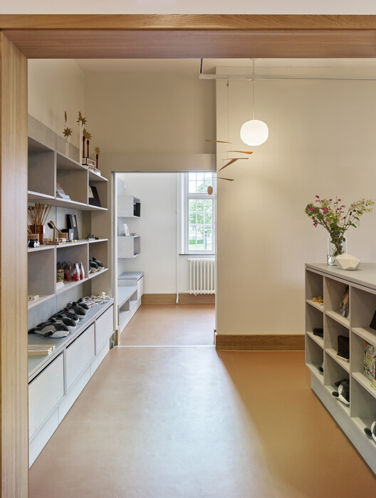 MIND Museum / C.F. Møller MIND Museum / C.F. Møller - Interior Photography, Closet, Wood, Shelving, Lighting
